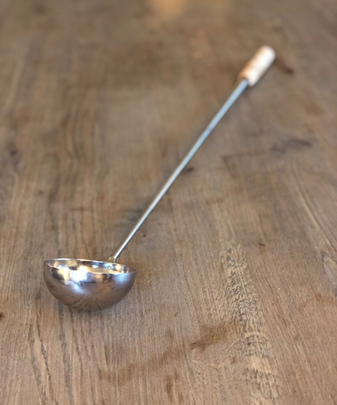 Justerbar øse